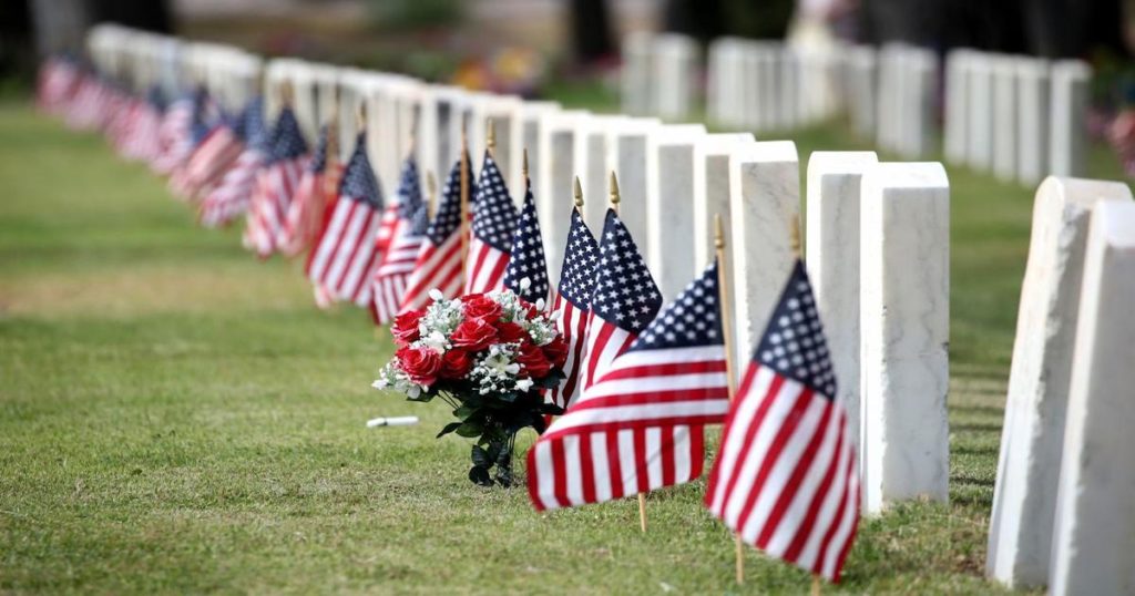 Flags in front of grave markers