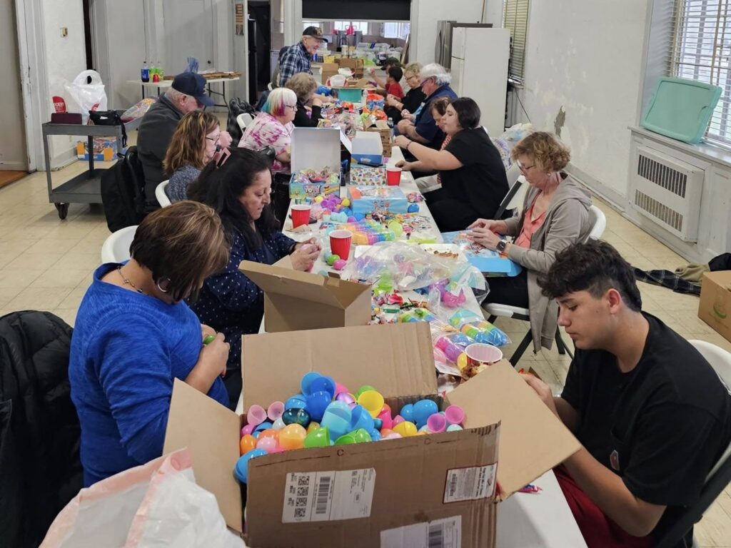 Filling eggs with candy for the annual Easter Egg Hunt