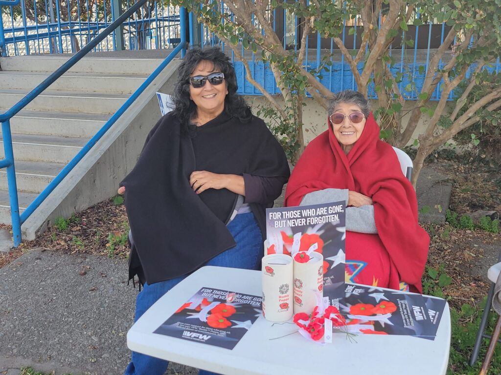 Charmaine and Lila selling Buddy Poppys