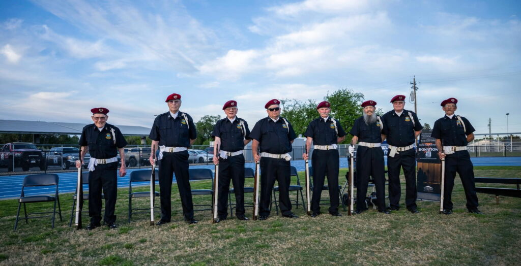 The Corning Veterans Honor Guard at the ready at the Orland, CA Wall that heals ceremony